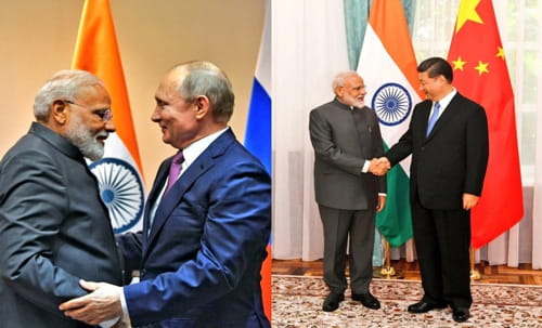 Indian Prime Minister Narendra Modi with Russian President Vladimir Putin (left) and Chinese President Xi Jinping (right).