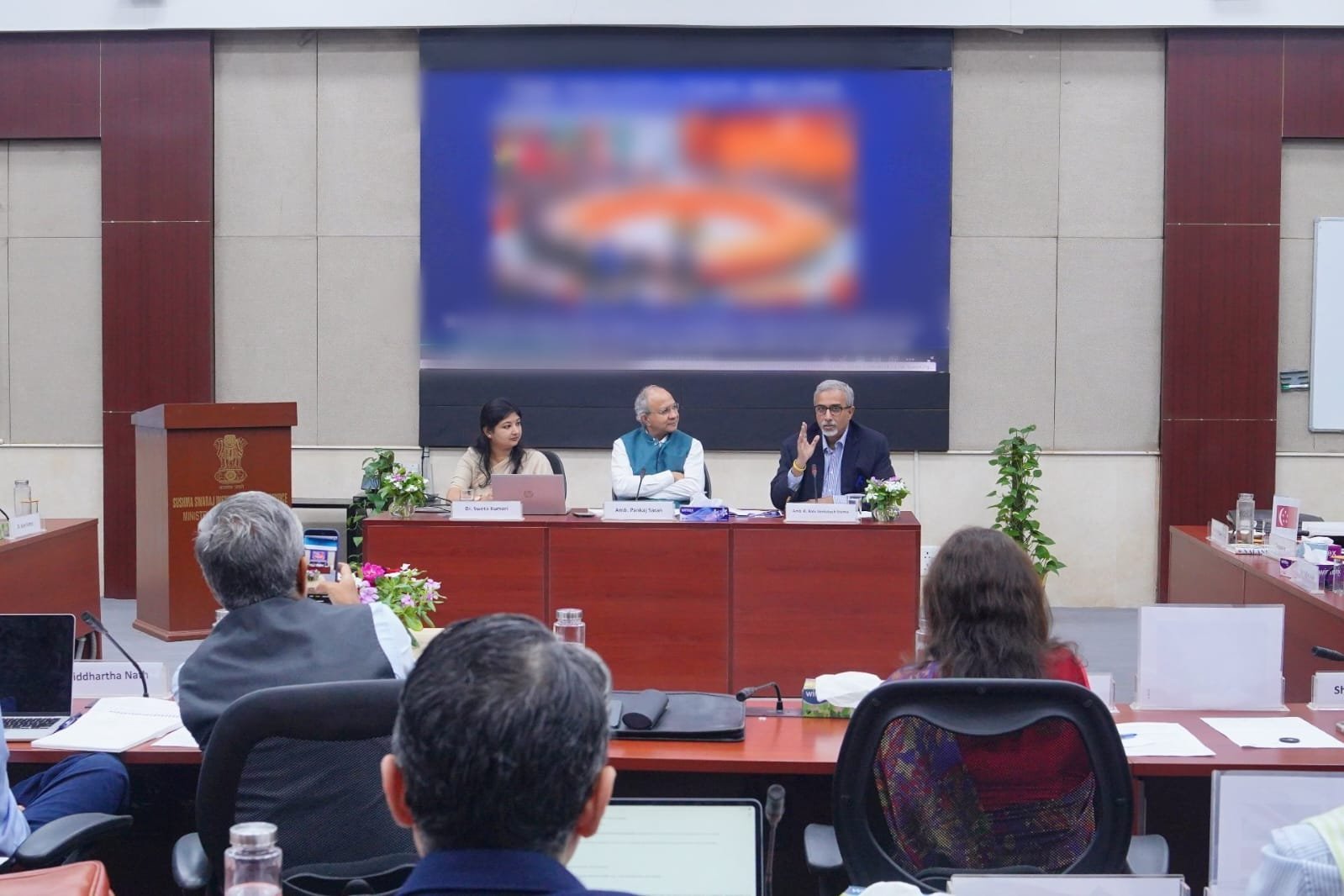 Ambassador Pankaj Saran and panelists address participants during NatStrat