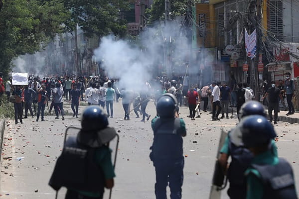 Students and riot police clash